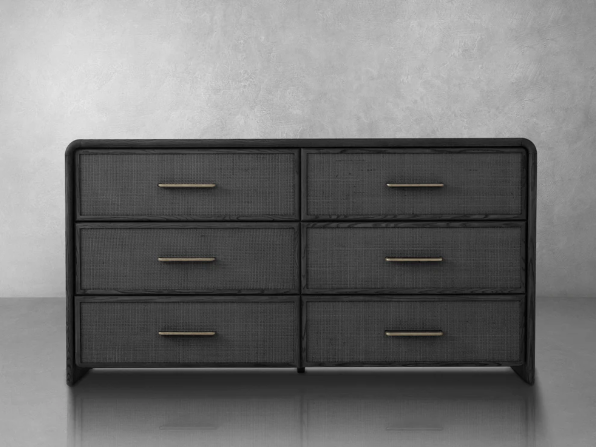 A sleek black dresser featuring six spacious drawers, perfect for organizing clothing and accessories