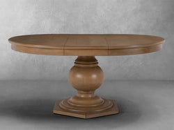 A round dining table featuring a sturdy wooden base, elegantly designed for a cozy dining experience