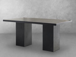 A table featuring two black legs and a wooden top, showcasing a modern and minimalist design.