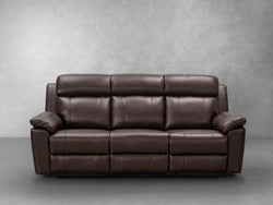 A brown leather reclining sofa is prominently displayed in the image, showcasing its elegant design and comfort