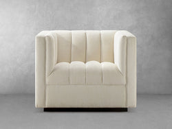 A white chair featuring a black base and a white upholstered seat, elegantly designed for modern interiors