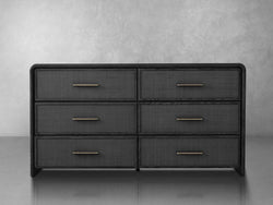 Modern black dresser with six drawers, offering stylish storage solutions for any bedroom or living space